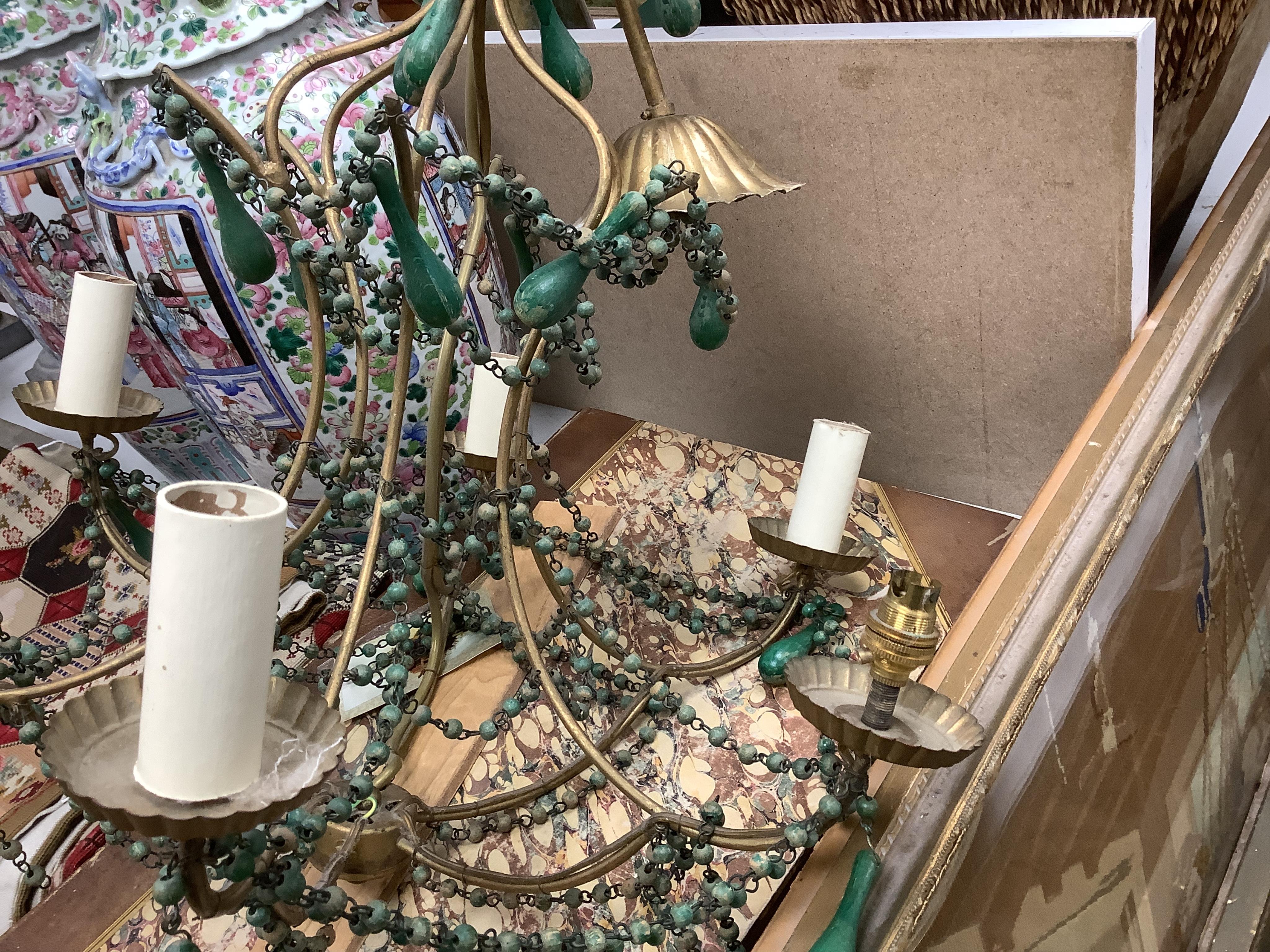 A beaded and gilt metal six branch electrolier, 86cm high